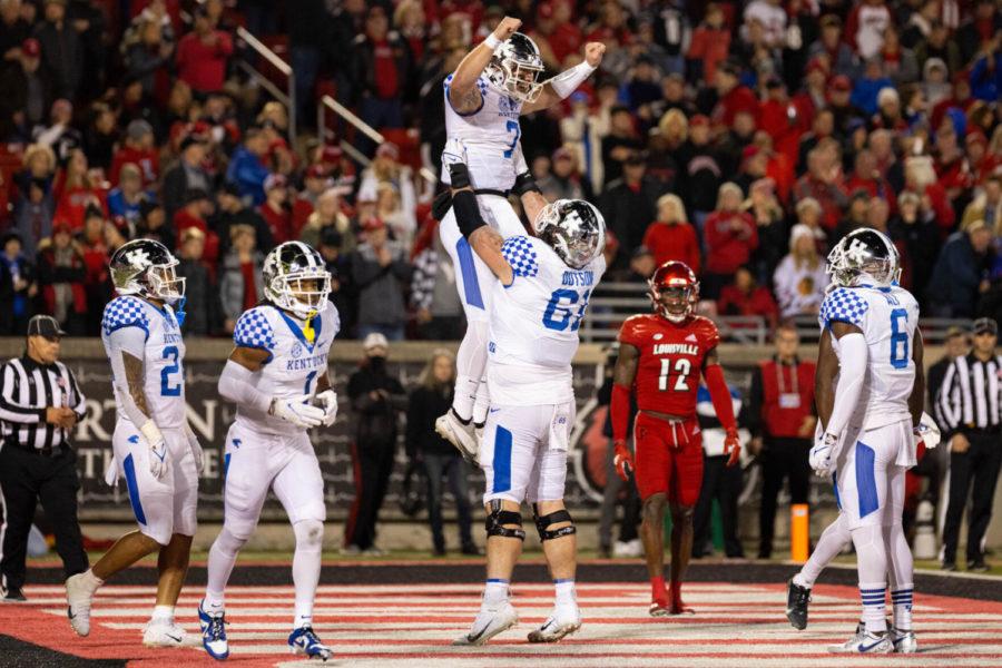 Kentucky+Wildcats+quarterback+Will+Levis+%287%29+is+lifted+into+the+air+by+guard+Austin+Dotson+%2861%29+after+a+Levis+touchdown+during+the+UK+vs.+Louisville+Governor%E2%80%99s+Cup+football+game+on+Saturday%2C+Nov.+27%2C+2021%2C+at+Cardinal+Stadium+in+Louisville%2C+Kentucky.+UK+won+52-21.+Photo+by+Michael+Clubb+%7C+Staff