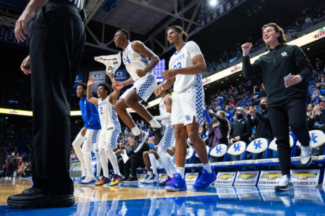 Kentucky’s bench reacts to a Kareem Watkins basket during the UK vs. Central Michigan men’s basketball game on Monday, Nov. 29, 2021, at Rupp Arena in Lexington, Kentucky. UK won 85-57. Photo by Michael Clubb | Staff