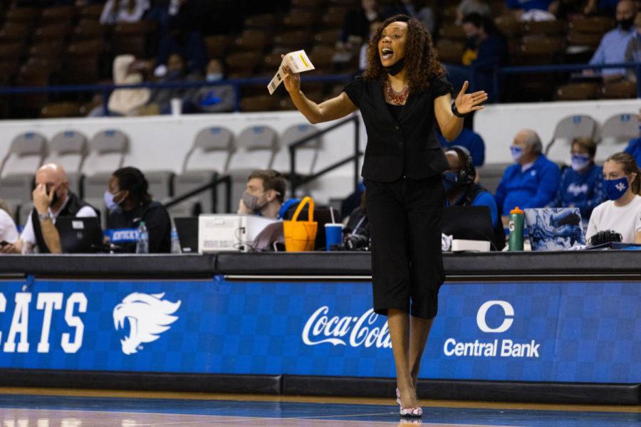 Kentucky Wildcats head coach Kyra Elzy coaches her team from the sidelines during the UK vs. Merrimack women’s basketball game on Sunday, Dec. 5, 2021, at Memorial Coliseum in Lexington, Kentucky. UK won 90-56. Photo by Michael Clubb | Staff