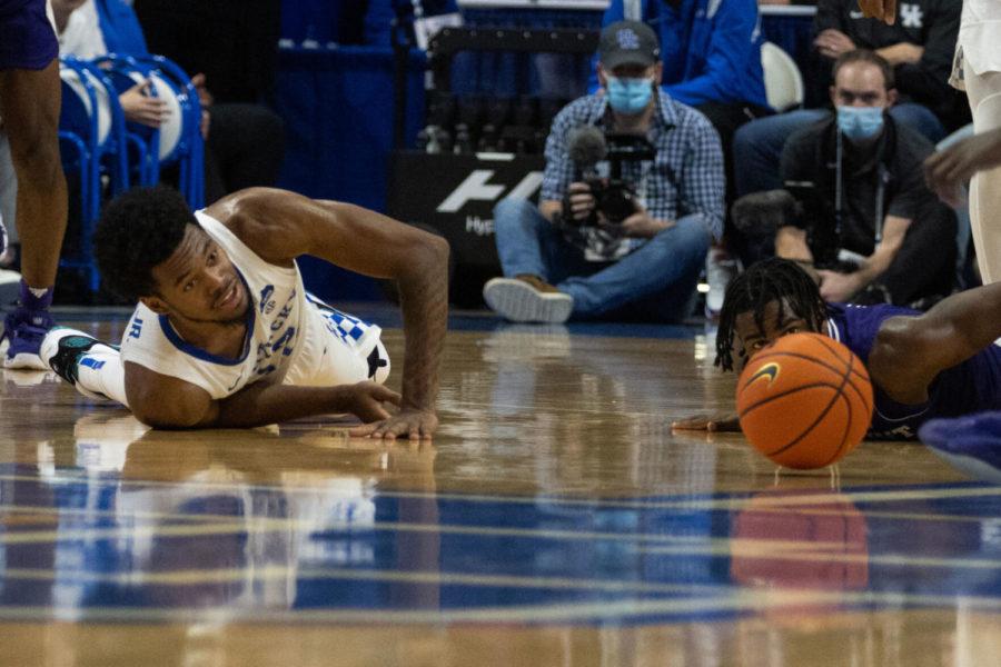 Kentucky+Wildcats+forward+Keion+Brooks+Jr.+%2812%29+and+his+opponent+eye+the+ball+during+the+University+of+Kentucky+vs.+High+Point+basketball+game+on+Friday%2C+Dec.+31%2C+2021%2C+at+Rupp+Arena+in+Lexington%2C+Kentucky.+Photo+by+Jackson+Dunavant+%7C+Staff