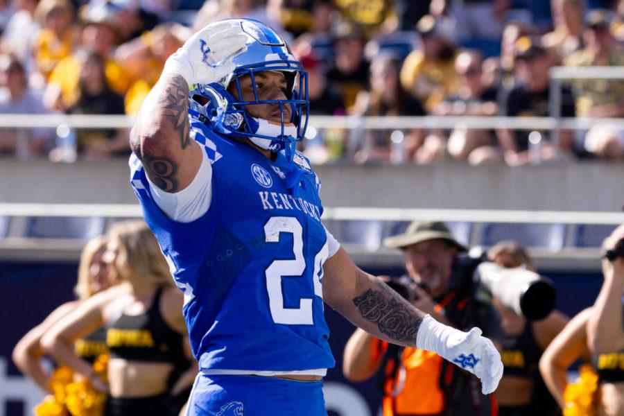 Kentucky Wildcats running back Chris Rodriguez Jr. (24) celebrates scoring a touchdown during the UK vs Iowa VRBO Citrus Bowl football game on Saturday, Jan. 1, 2022, at Camping World Stadium in Orlando, Florida. Photo by Michael Clubb | Staff