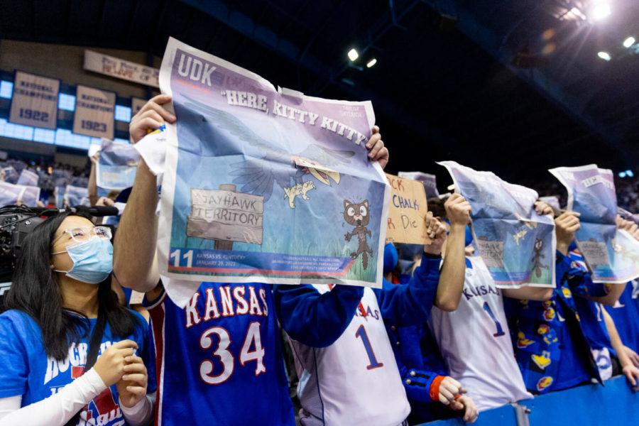 Kansas students hold up newspapers as Kentucky is introduced before the UK vs. Kansas basketball game on Saturday, Jan. 29, 2022, at Allen Fieldhouse in Lawrence, Kansas. UK won 80-62. Photo by Jack Weaver | Staff