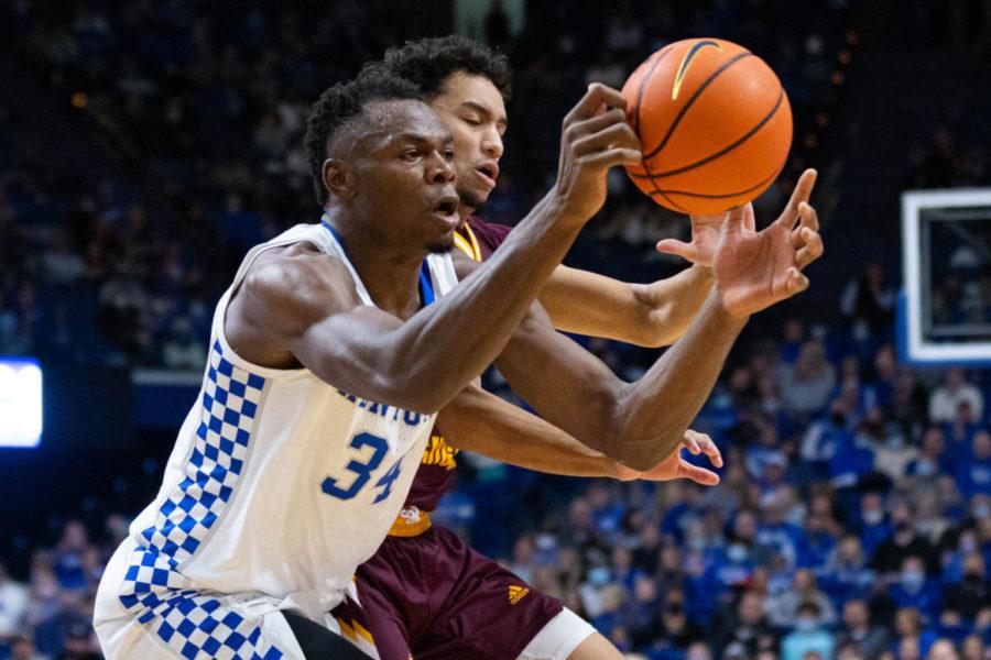 Kentucky Wildcats forward Oscar Tshiebwe (34) chases after a rebound during the UK vs. Central Michigan men’s basketball game on Monday, Nov. 29, 2021, at Rupp Arena in Lexington, Kentucky. UK won 85-57. Photo by Michael Clubb | Staff