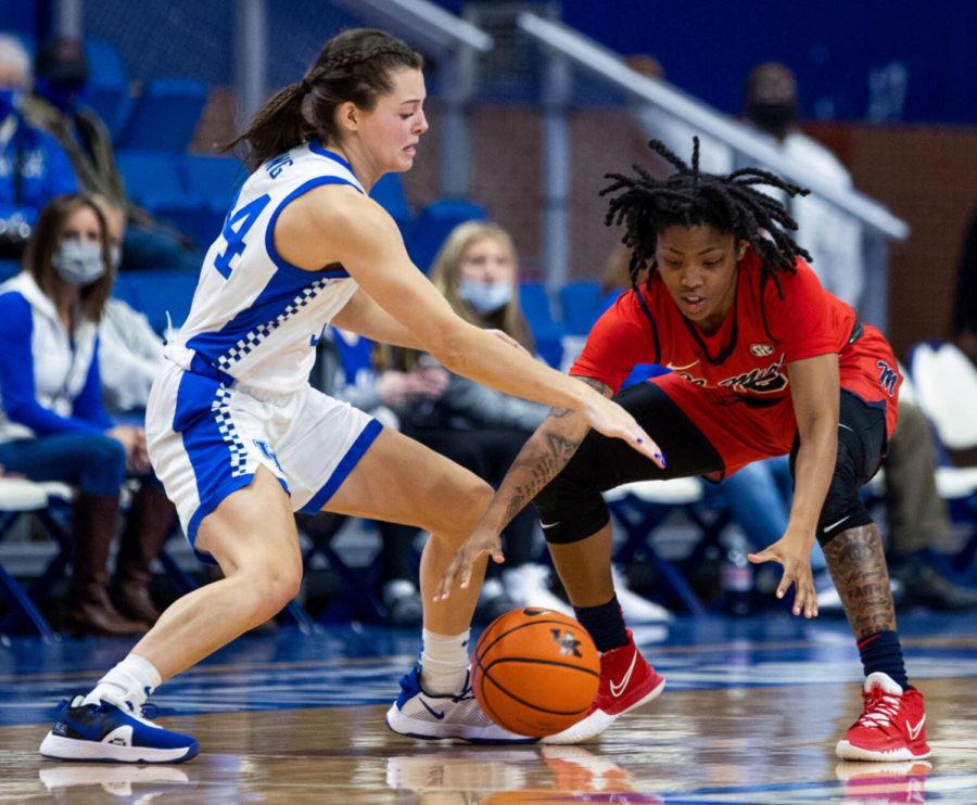 Kentucky guard Emma King (34) attempts to recover the ball during the UK vs. Ole Miss womens basketball game on Sunday, Jan. 23, 2022, at Rupp Arena in Lexington, Kentucky. UK lost 63-54. Photo by Isabel McSwain | Staff