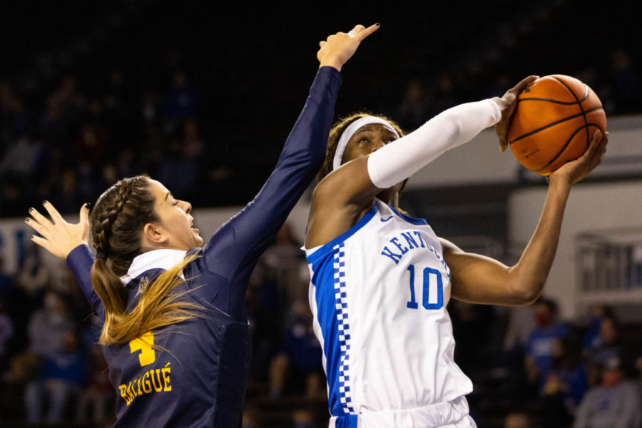 Kentucky Wildcats guard Rhyne Howard (10) tries to put the ball up during the UK vs. Merrimack women’s basketball game on Sunday, Dec. 5, 2021, at Memorial Coliseum in Lexington, Kentucky. UK won 90-56. Photo by Michael Clubb | Staff