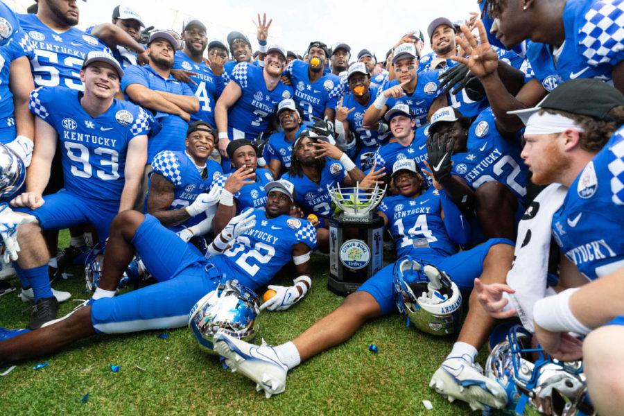 Kentucky+poses+with+their+trophy+after+the+UK+vs+Iowa+VRBO+Citrus+Bowl+football+game+on+Saturday%2C+Jan.+1%2C+2022%2C+at+Camping+World+Stadium+in+Orlando%2C+Florida.+UK+won+20-17.+Photo+by+Michael+Clubb+%7C+Staff