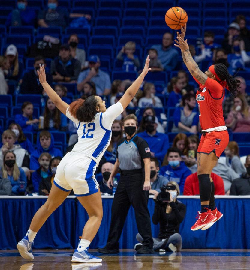Kentucky guard Treasure Hunt (12) attempts to block a shot during the UK vs. Ole Miss womens basketball game on Sunday, Jan. 23, 2022, at Rupp Arena in Lexington, Kentucky. UK lost 63-54. Photo by Isabel McSwain | Staff