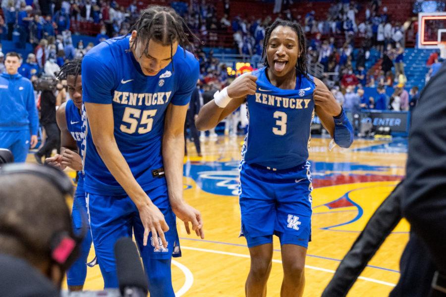 Kentucky Wildcats forward Lance Ware (55) and guard TyTy Washington Jr. (3) dance off the court after the UK vs. Kansas basketball game on Saturday, Jan. 29, 2022, at Allen Fieldhouse in Lawrence, Kansas. UK won 80-62. Photo by Jack Weaver | Staff