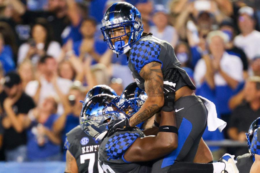 Kentucky+wide+receiver+WanDale+Robinson+%281%29+celebrates+scoring+a+touchdown+during+the+first+half+of+an+NCAA+college+football+game+against+LSU+in+Lexington%2C+Ky.%2C+Saturday%2C+Oct.+9%2C+2021.+%28AP+Photo%2FMichael+Clubb%29