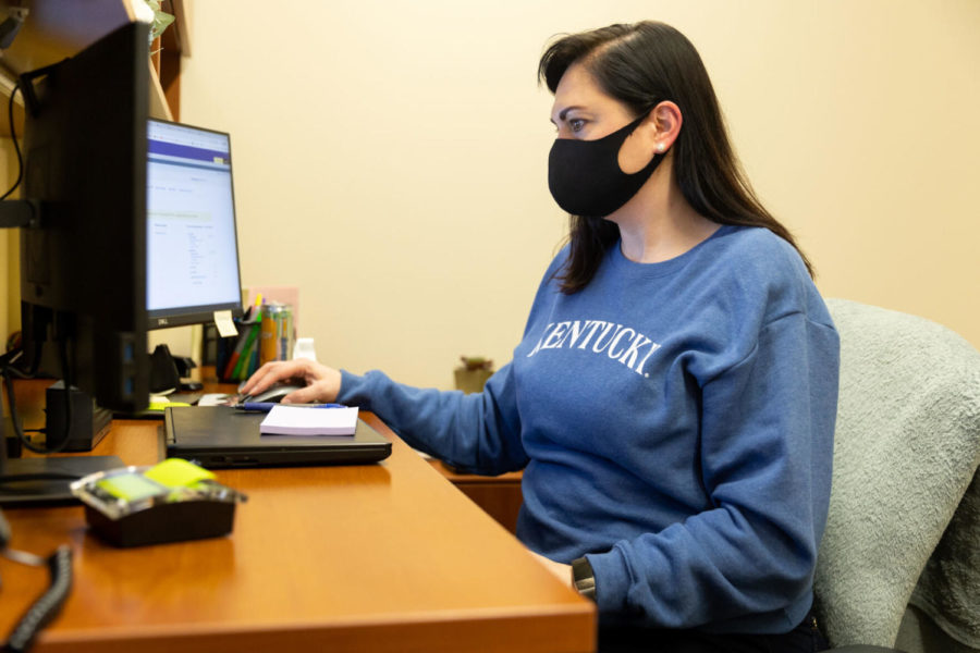 Tricia Henry, an academic advisor in the Gatton College of Business, works in her office on Tuesday, Feb. 22, 2022, at the University of Kentucky in Lexington, Kentucky. Photo by Jack Weaver | Staff