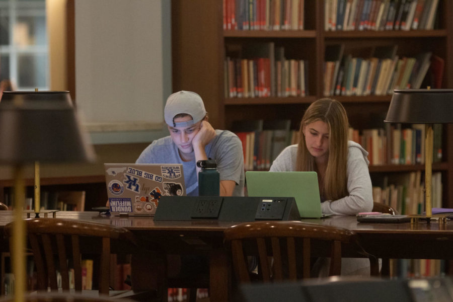 Sophomores Jack Watson and Elizabeth Oiler work on homework at the William T. Young Library on Wednesday, Sept. 1, 2021 at 12:48 a.m., in Lexington, Kentucky. Photo by Kaitlyn Skaggs | Staff
