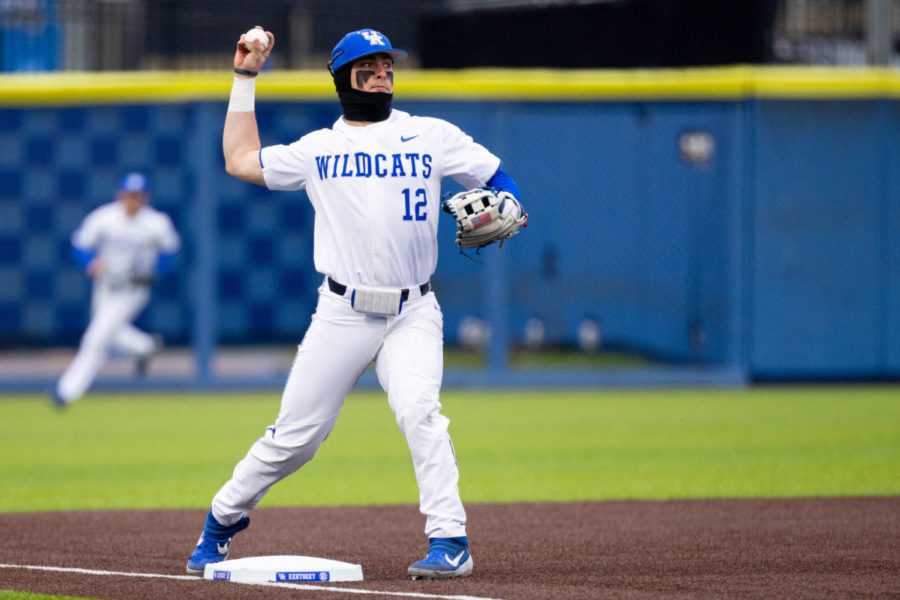 Kentucky Wildcats infielder Chase Estep (12) throws the ball to first base during the UK vs. Bellarmine baseball game on Wednesday, Feb. 23, 2022, at Kentucky Proud Park in Lexington, Kentucky. UK won 3-2. Photo by Michael Clubb | Staff