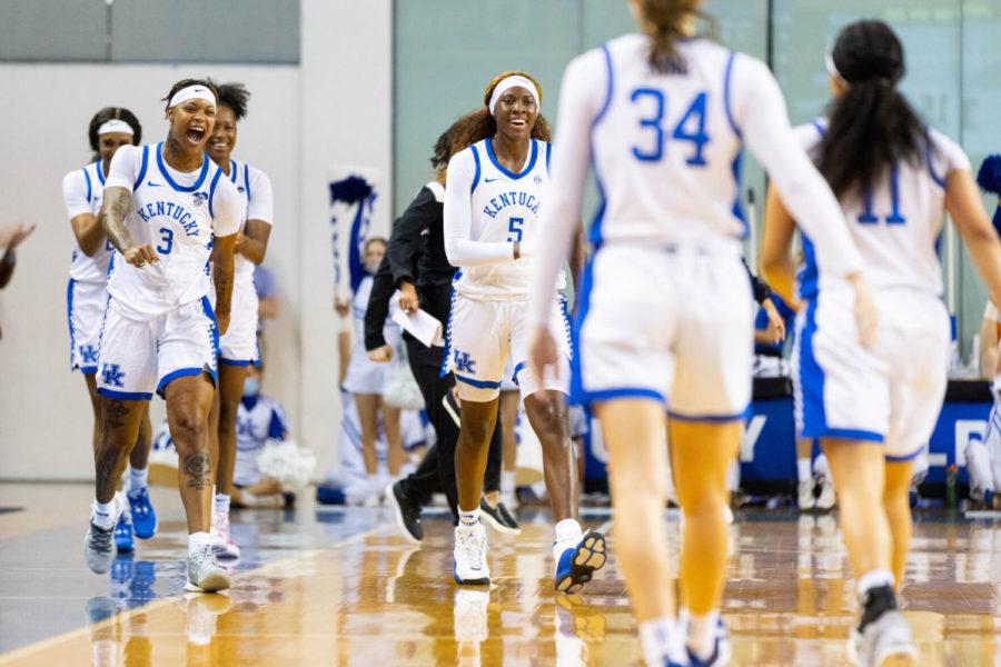 Kentucky+Wildcats+guard+Jazmine+Massengill+%283%29+and+guard+Rhyne+Howard+%285%29+walk+onto+the+court+to+celebrate+with+their+team+during+a+timeout+during+the+UK+vs.+Auburn+womens+basketball+game+on+Sunday%2C+Feb.+27%2C+2022%2C+at+Memorial+Coliseum+in+Lexington%2C+Kentucky.+UK+won+90-62.+Photo+by+Michael+Clubb+%7C+Staff
