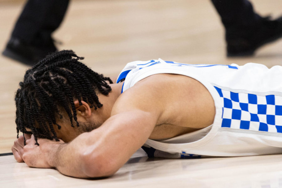 Kentucky Wildcats guard Davion Mintz (10) lays on the ground during the UK vs. Saint Peter’s mens basketball game in the first round of the NCAA Tournament on Thursday, March 17, 2022, at Gainbridge Arena in Indianapolis, Indiana. UK lost 85-79 in overtime. Photo by Michael Clubb | Staff
