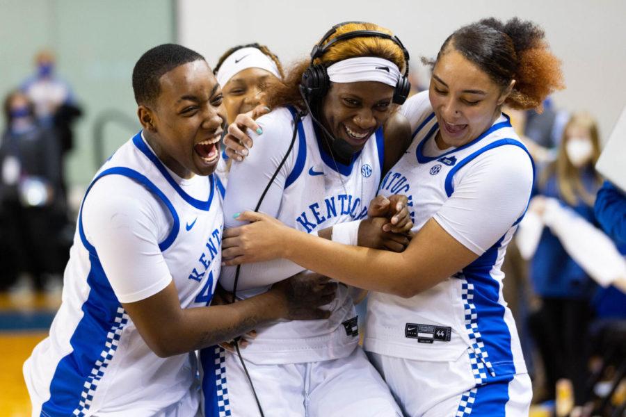 Kentucky Wildcats guard Rhyne Howard (5) is swarmed by teammates after the UK vs. Auburn womens basketball game on Sunday, Feb. 27, 2022, at Memorial Coliseum in Lexington, Kentucky. UK won 90-62. Photo by Michael Clubb | Staff