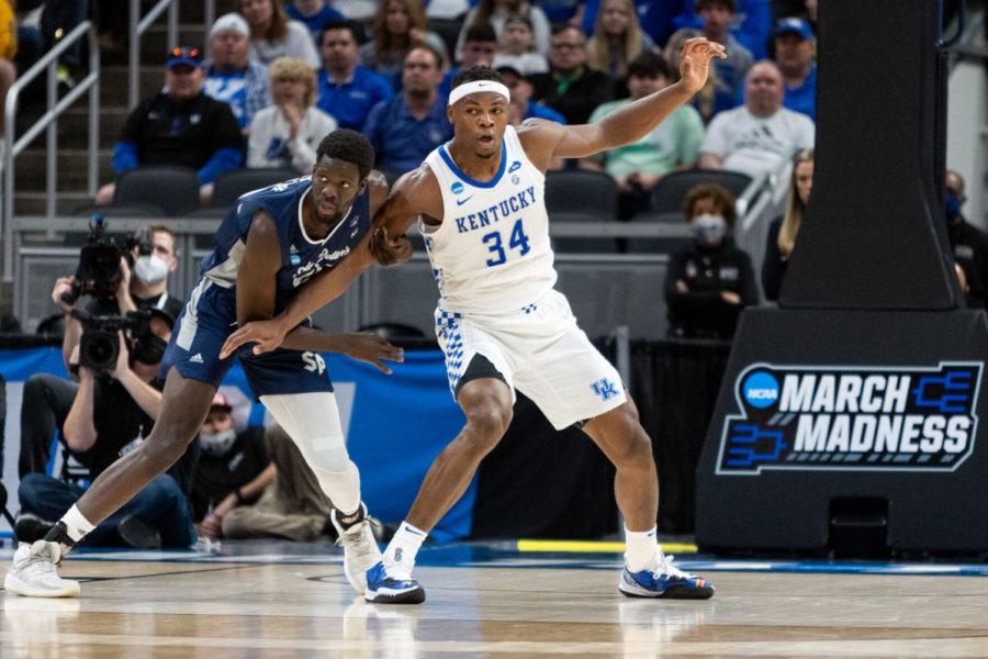 Kentucky+Wildcats+forward+Oscar+Tshiebwe+%2834%29+blocks+out+an+opponent+under+the+basket+during+the+UK+vs.+Saint+Peter%E2%80%99s+mens+basketball+game+in+the+first+round+of+the+NCAA+Tournament+on+Thursday%2C+March+17%2C+2022%2C+at+Gainbridge+Fieldhouse+in+Indianapolis%2C+Indiana.+UK+lost+85-79.+Photo+by+Jack+Weaver+%7C+Staff