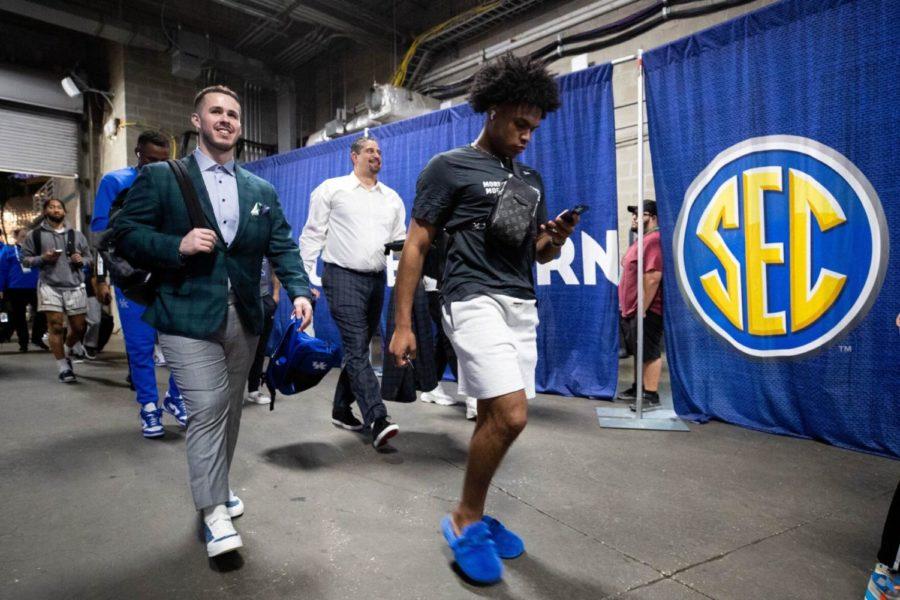 Kentucky Wildcats Sahvir Wheeler, right, and assistant Brad Calipari, left, walk into Amalie Arena before the UK vs. Vanderbilt mens SEC Tournament quarterfinals basketball game on Friday, March 11, 2022, in Tampa, Florida. Photo by Michael Clubb | Staff