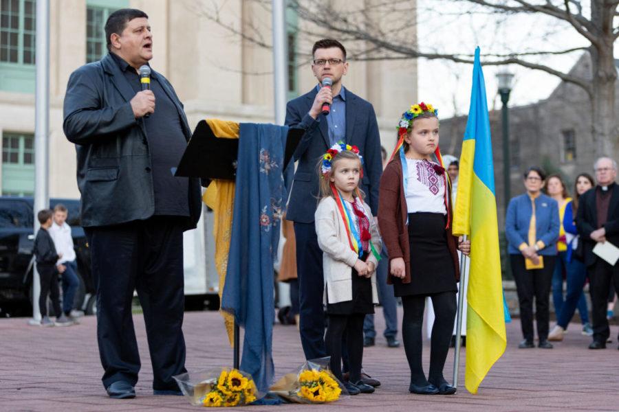 Event organizers address a crowd gathered for a vigil in support of Ukraine on Wednesday, March 2, 2022, at Courthouse Plaza in Lexington, Kentucky. Photo by Jack Weaver | Staff