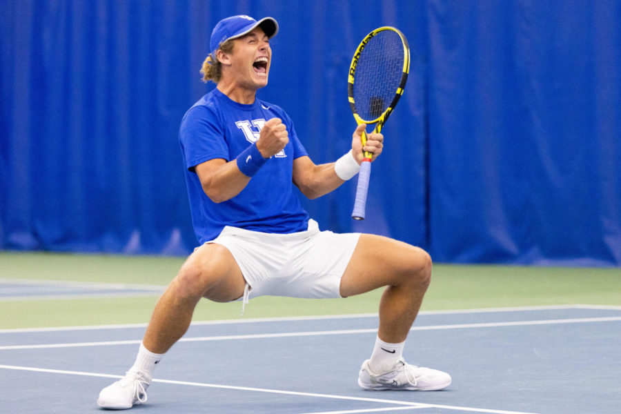 Liam Draxl celebrates winning a set during the UK vs. Virginia tennis match on Thursday, March 31, 2022, at Hilary J. Boone Tennis Complex in Lexington, Kentucky. UK lost 4-2. Photo by Michael Clubb | Staff