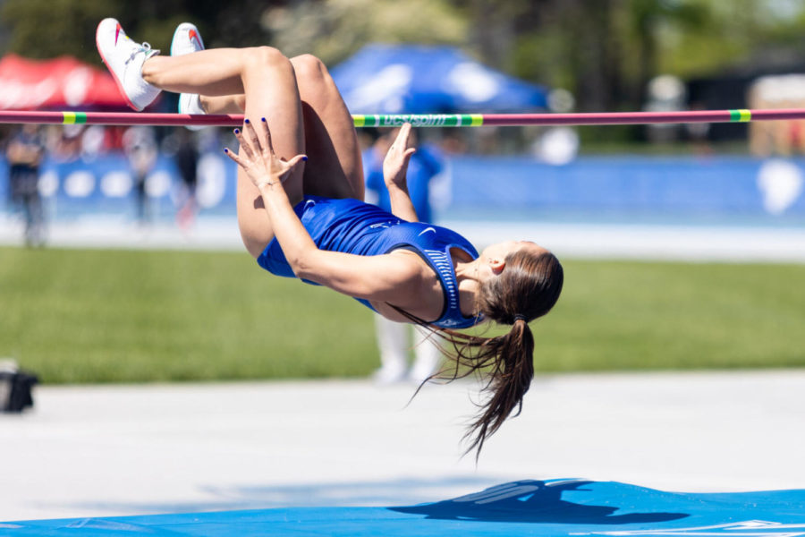 Senior Carly Hinkle clears the bar in the high jump during the Kentucky Invitational meet on Saturday, May 1, 2021, at Shively Track and Field Stadium in Lexington, Kentucky. Photo by Jack Weaver | Staff