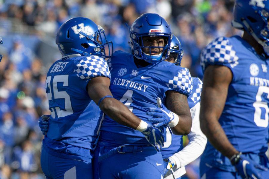 Kentucky celebrates Josh Paschal’s (4) first tackle since being diagnosed with cancer during the game against the Middle Tennessee Blue Raiders on Saturday, Nov. 17, 2018, at Kroger Field, in Lexington, Kentucky. Today, Paschal made his season debut after battling cancer. Kentucky defeated MTSU 34-23. Photo by Arden Barnes | Staff