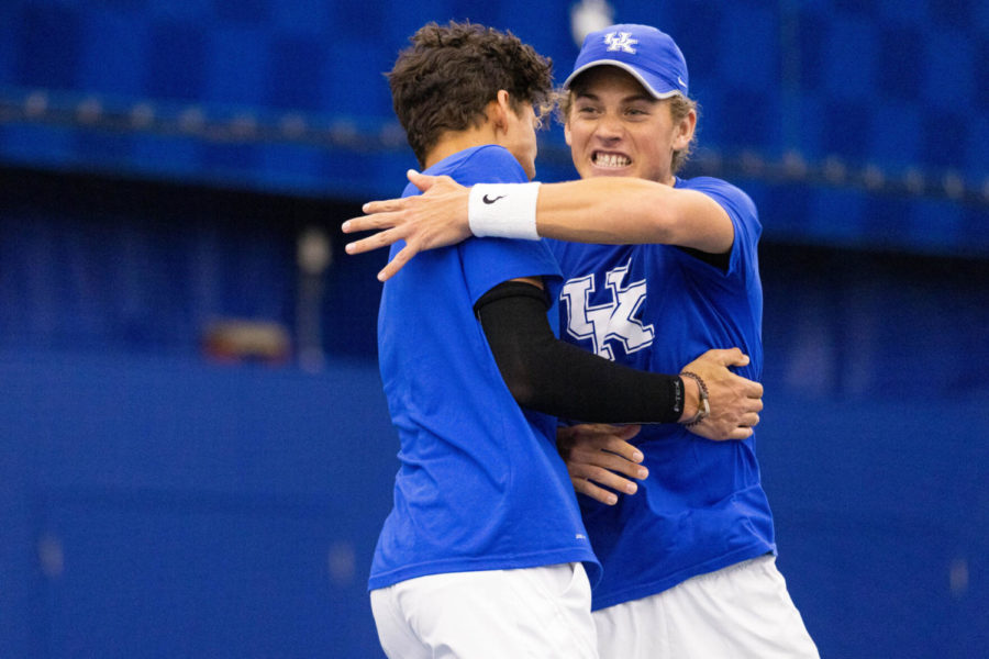 Alexandre LeBlanc, left, and Liam Draxl, right, celebrate winning their doubles match during the UK vs. Virginia tennis match on Thursday, March 31, 2022, at Hilary J. Boone Tennis Complex in Lexington, Kentucky. UK lost 4-2. Photo by Michael Clubb | Staff