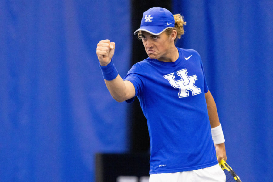 Liam Draxl celebrates winning a game during the UK vs. Virginia tennis match on Thursday, March 31, 2022, at Hilary J. Boone Tennis Complex in Lexington, Kentucky. UK lost 4-2. Photo by Michael Clubb | Staff