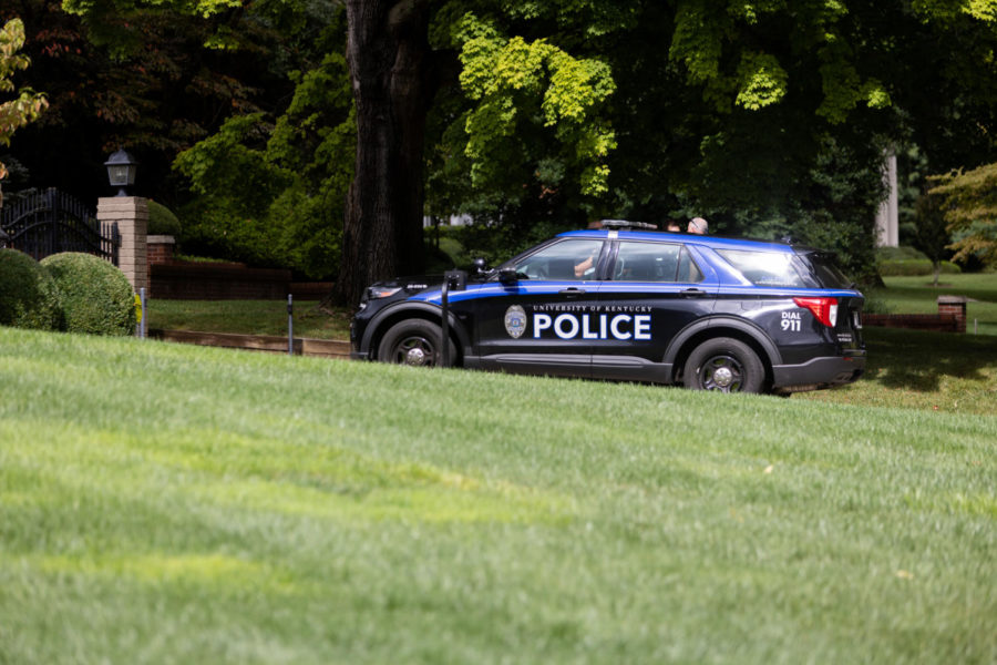 A University of Kentucky police car is parked in the driveway of UK mens basketball head coach John Calipari on Tuesday, Sept. 6, 2022, at 11:32 a.m. Two additional police vehicles were parked outside the home on Richmond Road in Lexington, Kentucky.