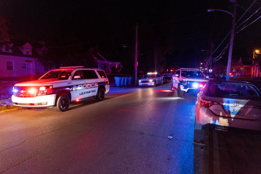 Police vehicles are parked along University Avenue after responding to reports of shots being fired on Thursday, Sept. 8, 2022, in Lexington, Kentucky. Photo by Jack Weaver | Staff
