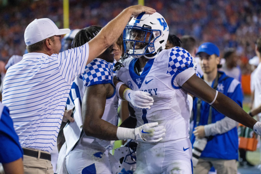 Kentucky+Wildcats+defensive+back+Keidron+Smith+%281%29+celebrates+on+the+sideline+after+returning+an+interception+for+a+touchdown+during+the+No.+20+Kentucky+vs.+No.+12+Florida+football+game+on+Saturday%2C+Sept.+10%2C+2022%2C+on+Ben+Hill+Griffin+Stadium+in+Gainesville%2C+Florida.+UK+won+26-16.+Photo+by+Jack+Weaver+%7C+Kentucky+Kernel