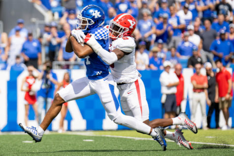 Kentucky Wildcats wide receiver DeMarcus Harris (4) is tackled during the No. 9 Kentucky vs. Youngstown State football game on Saturday, Sept. 17, 2022, at Kroger Field in Lexington, Kentucky. UK won 31-0. Photo by Jack Weaver | Staff