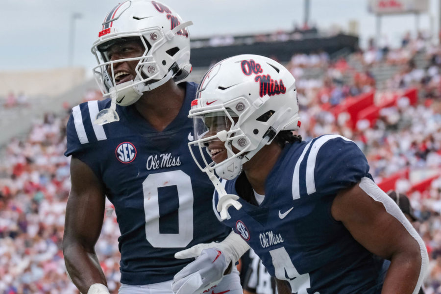 Ole+Miss+Rebels+tight+end+Michael+Trigg+%280%29+and+running+back+Quinshon+Judkins+%284%29+celebrate+after+a+touchdown+by+Judkins+during+Ole+Miss%E2%80%99+season+opener+against+Troy+on+Sept.+3%2C+2022.+Photo+by+HG+Biggs+%7C+The+Daily+Mississippian