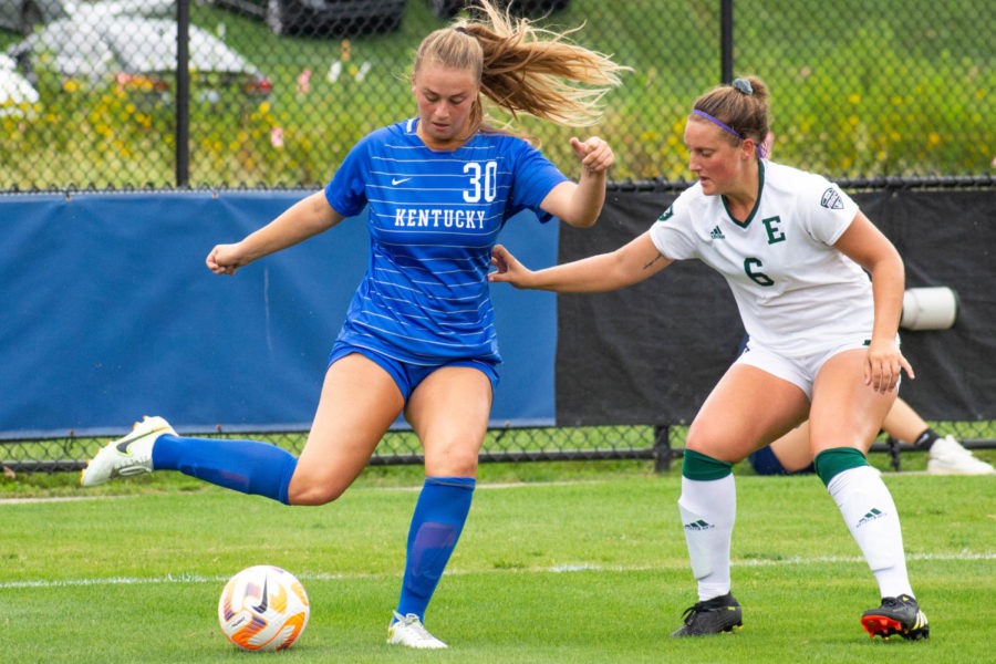 Kentucky Wildcats forward Jordyn Rhodes (30) keeps the ball away from a defender during the Kentucky vs. Eastern Michigan women’s soccer match on Sunday, Sept. 11, 2022, at the Wendell and Vickie Bell Soccer Complex in Lexington, Kentucky. UK won 5-1. Photo by Abby Szydlik | Staff