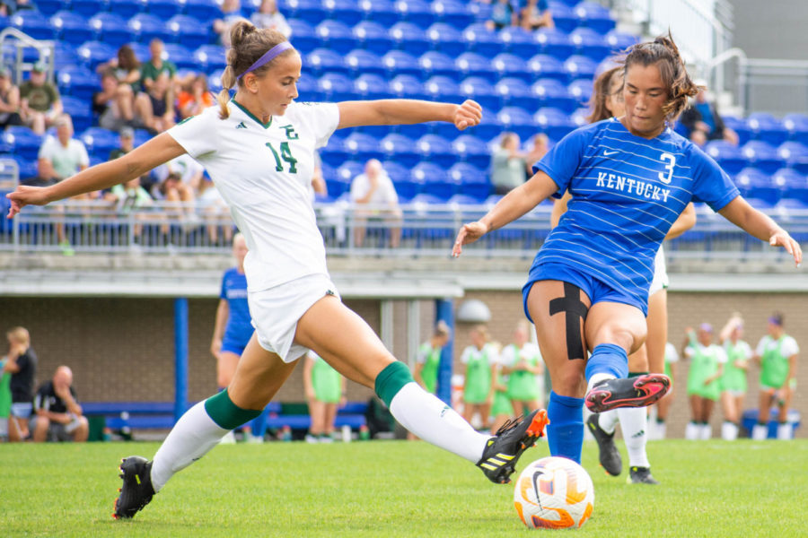 Kentucky Wildcats midfielder Anna Young (3) passes the ball past a defender during the Kentucky vs. Eastern Michigan women’s soccer match on Sunday, Sept. 11, 2022, at the Wendell and Vickie Bell Soccer Complex in Lexington, Kentucky. UK won 5-1. Photo by Abby Szydlik | Staff