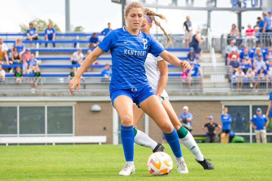 Kentucky Wildcats midfielder Ava Hellner (2) keeps the ball away from a defender during the Kentucky vs. Eastern Michigan women’s soccer match on Sunday, Sept. 11, 2022, at the Wendell and Vickie Bell Soccer Complex in Lexington, Kentucky. UK won 5-1. Photo by Abby Szydlik | Staff