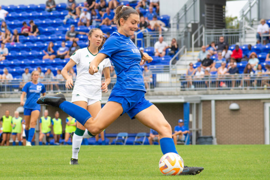 Kentucky Wildcats defender Taya Hjorth (12) kicks the ball during the Kentucky vs. Eastern Michigan women’s soccer match on Sunday, Sept. 11, 2022, at the Wendell and Vickie Bell Soccer Complex in Lexington, Kentucky. UK won 5-1. Photo by Abby Szydlik | Staff