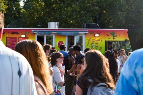 Students wait in line for Nathan’s Taqueria food truck at the Eat Around the World SAB event on Friday, Sept. 16, 2022, at the University of Kentucky in Lexington, Kentucky. Photo by Abbey Cutrer | Staff