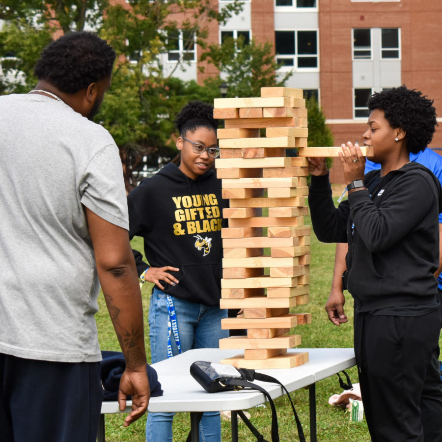 Students and families play Jenga at the Bluegrass Biscuit Bash as a part of Family Weekend on Saturday, Sept. 24, 2022, at the University of Kentucky in Lexington, Kentucky. Photo by Abbey Cutrer | Staff