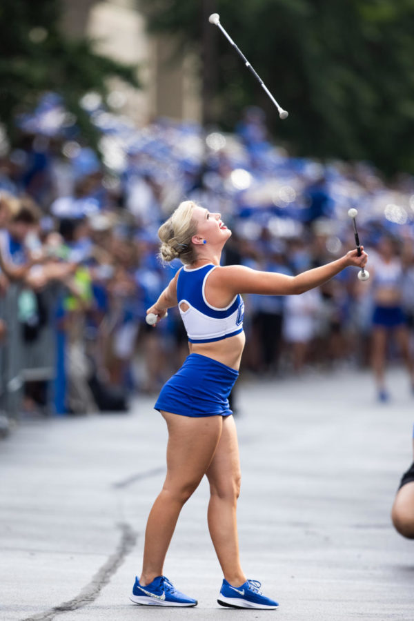 A UK band majorette throws a baton during Cat Walk before the Kentucky vs. Miami Ohio football game on Saturday, Sept. 3, 2022, at Kroger Field in Lexington, Kentucky. Photo by Isabel McSwain | Staff