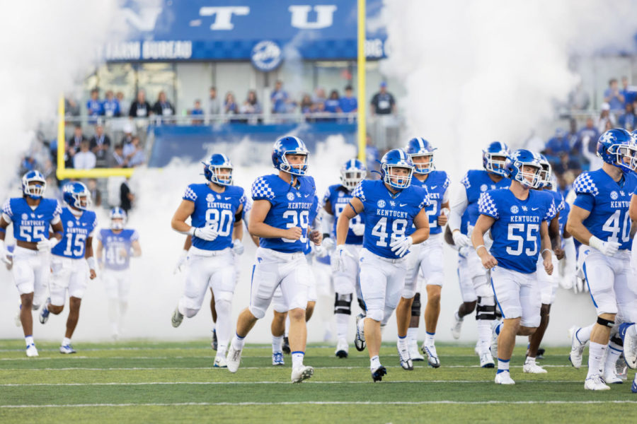 The Kentucky Wildcats ran onto the field before the No. 8 Kentucky vs. Northern Illinois football game on Saturday, Sept. 24, 2022, at Kroger Field in Lexington, Kentucky. Kentucky won 31-23. Photo by Isabel McSwain | Staff