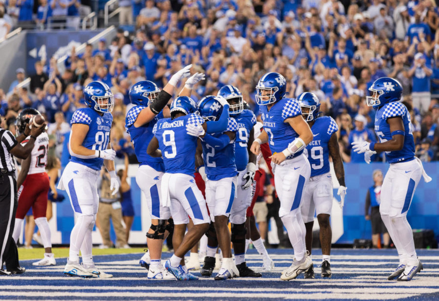 The Wildcats celebrate after a touchdown during the No. 8 Kentucky vs. Northern Illinois football game on Saturday, Sept. 24, 2022, at Kroger Field in Lexington, Kentucky. Kentucky won 31-23. Photo by Isabel McSwain | Staff