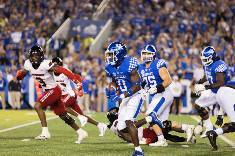 Kentucky Wildcats running back Kavosiey Smoke (0) runs down the field during the No. 8 Kentucky vs. Northern Illinois football game on Saturday, Sept. 24, 2022, at Kroger Field in Lexington, Kentucky. Kentucky won 31-23. Photo by Isabel McSwain | Staff