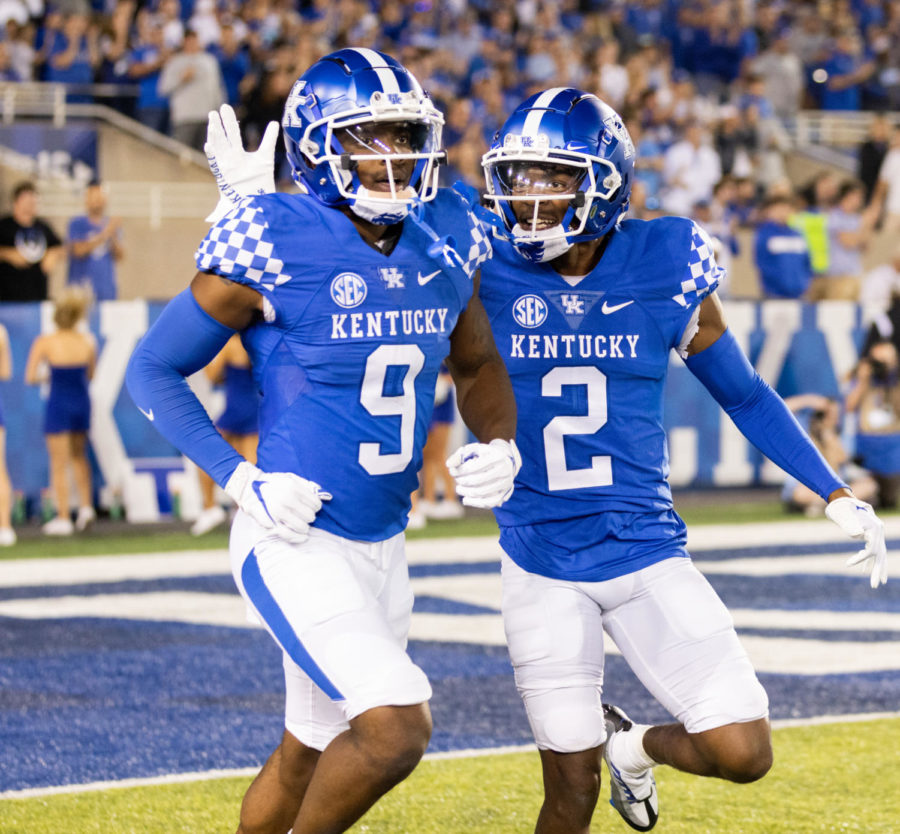 Kentucky Wildcats wide receivers Tayvion Robinson (9) and Barion Brown (2) celebrate a touchdown during the No. 8 Kentucky vs. Northern Illinois football game on Saturday, Sept. 24, 2022, at Kroger Field in Lexington, Kentucky. Kentucky won 31-23. Photo by Isabel McSwain | Staff