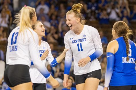 Kentucky players celebrate during the Kentucky vs. LSU volleyball match on Sunday, Sept. 25, 2022, at Memorial Coliseum in Lexington, Kentucky. Photo by Isabel McSwain | Kentucky Kernel