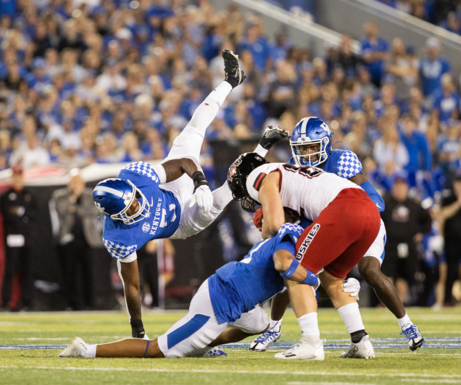 Kentucky Wildcats linebacker DeAndre Square (5) tackles a player during the No. 8 Kentucky vs. Northern Illinois football game on Saturday, Sept. 24, 2022, at Kroger Field in Lexington, Kentucky. Kentucky won 31-23. Photo by Isabel McSwain | Staff