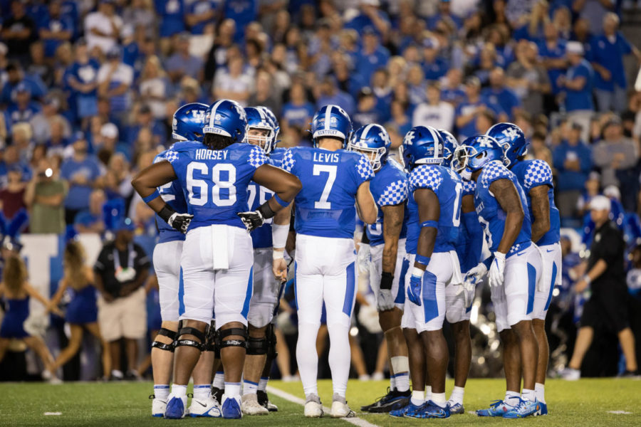 The Kentucky Wildcats huddle during the No. 8 Kentucky vs. Northern Illinois football game on Saturday, Sept. 24, 2022, at Kroger Field in Lexington, Kentucky. Kentucky won 31-23. Photo by Isabel McSwain | Staff