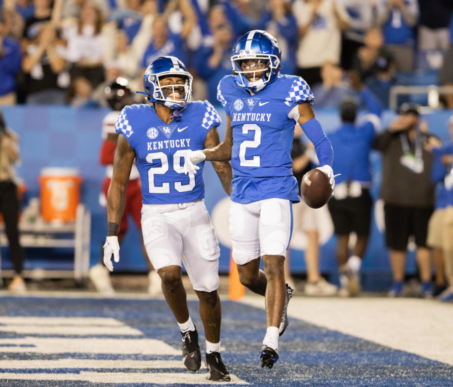 Kentucky Wildcats wide receiver Barion Brown (2) and running back LaVell Wright (29) celebrate a touchdown during the No. 8 Kentucky vs. Northern Illinois football game on Saturday, Sept. 24, 2022, at Kroger Field in Lexington, Kentucky. Kentucky won 31-23. Photo by Isabel McSwain | Staff