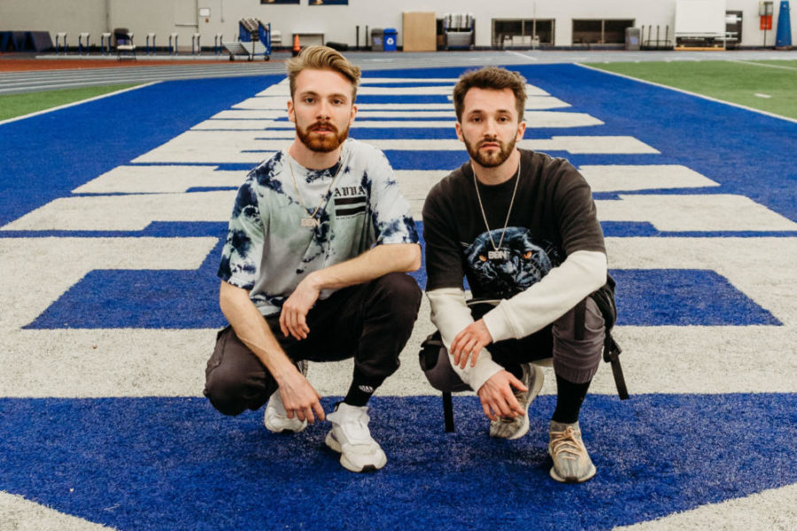 Peyton Whitt, left, and Tanner Whitt, right, pose for a photo at the University of Kentucky. Photo by Tate Media Productions.