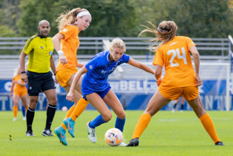 Kentucky Wildcats forward Hannah Richardson (8) dribbles past defenders during the Kentucky vs. Tennessee womens soccer match on Sunday, Sept. 25, 2022, at the Wendell & Vickie Bell Soccer Complex in Lexington, Kentucky. Photo by Michael Smallwood | Kentucky Kernel