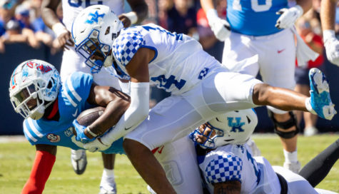 Kentucky Wildcats defensive back Carrington Valentine (14) makes a tackle during the No. 7 Kentucky vs. No. 14 Ole Miss football game on Saturday, Oct. 1, 2022, at Vaught Hemingway Stadium in Oxford, Mississippi. Ole Miss won 22-19. Photo by Jack Weaver | Staff